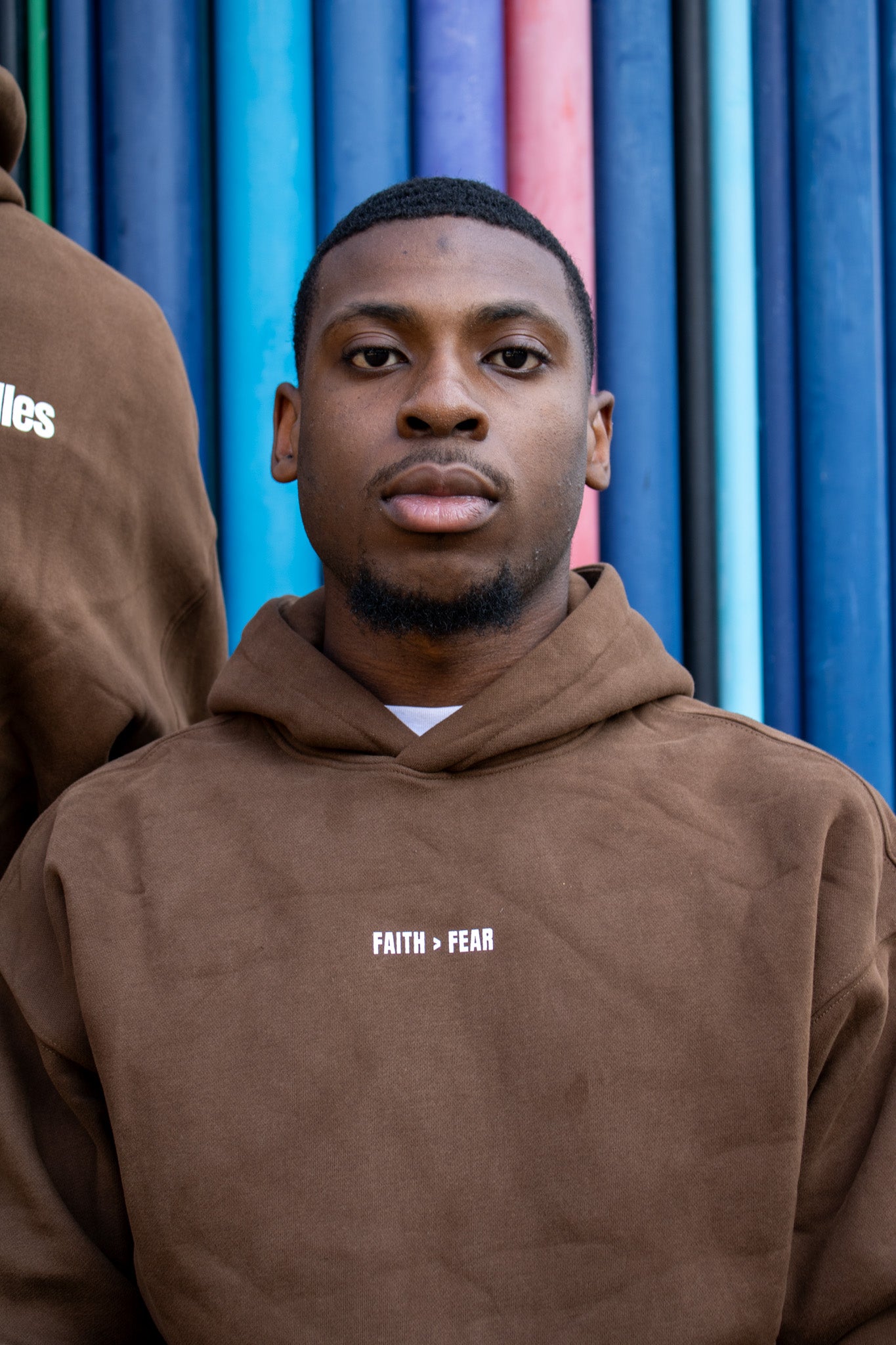 Le hoodie "Faith > Fear"