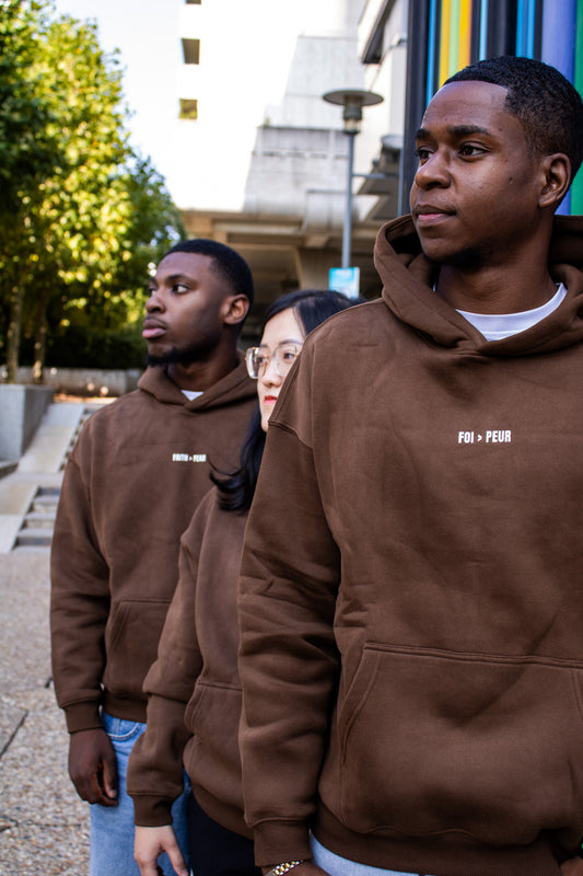 Le hoodie "Faith > Fear"